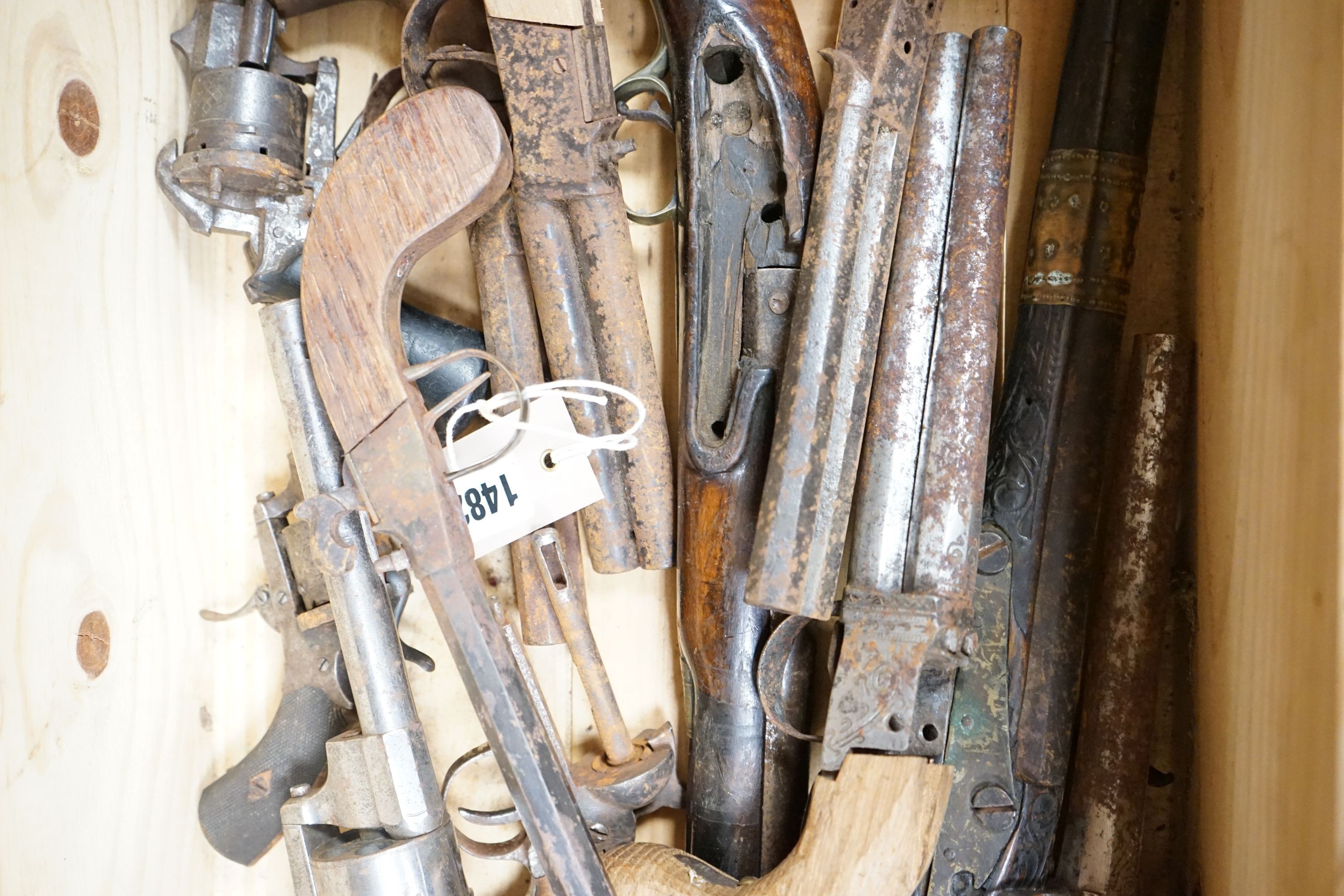 A group of percussion cap pistols and pin fire revolvers, 19th century, for restoration.